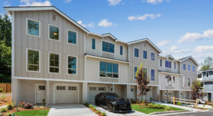 townhomes several in a row car parked